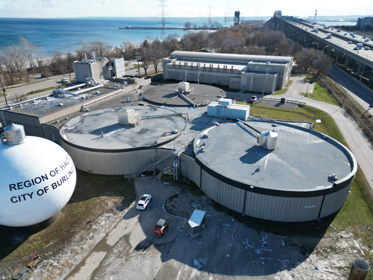 Aerial view of treatment tanks at a Burlington water and wastewater construction site in Ontario.